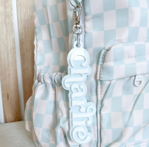 Double sided acrylic bag tag Charlie in light blue