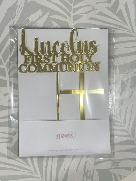Gold 'Lincoln's First Holy Communion' card with a cross on a white background