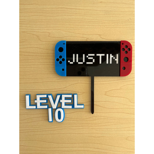 Nintendo switch console inspired cake topper and charm 