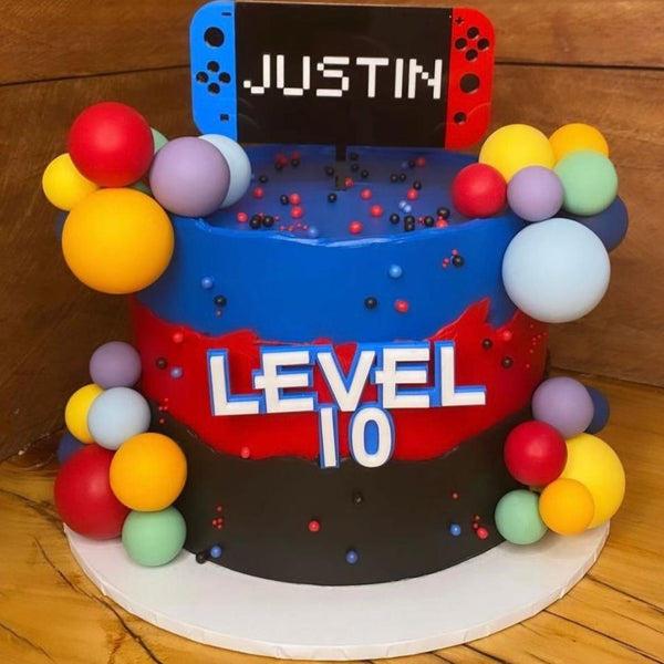 Nintendo switch inspired theme cake topper personalised with level 10 charm 