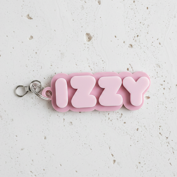 IZZY Pink on Travertine