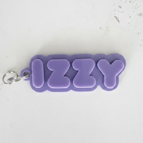 IZZY Purple on Travertine