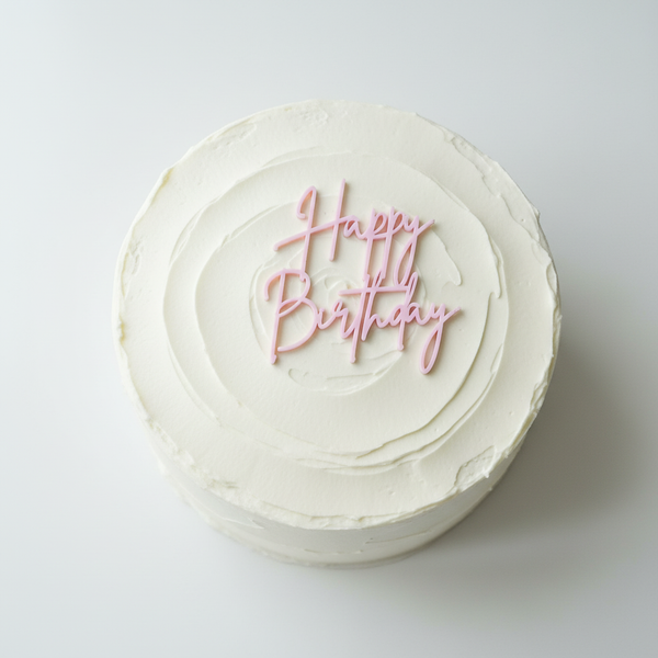 Pink charm small flat on white cake