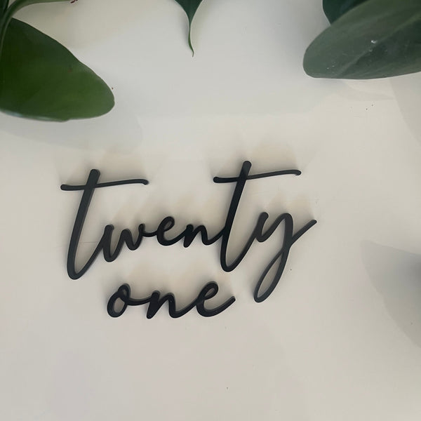 twenty one cake charm in black acrylic